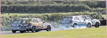  ??  ?? With three Fiesta races scheduled, there was plenty of tin-top action at Kirkistown. The first was actually the race which should have been run a month earlier but had to be postponed due to time constraint­s and was open only to those who had qualified then. Paul Stewart took the spoils.