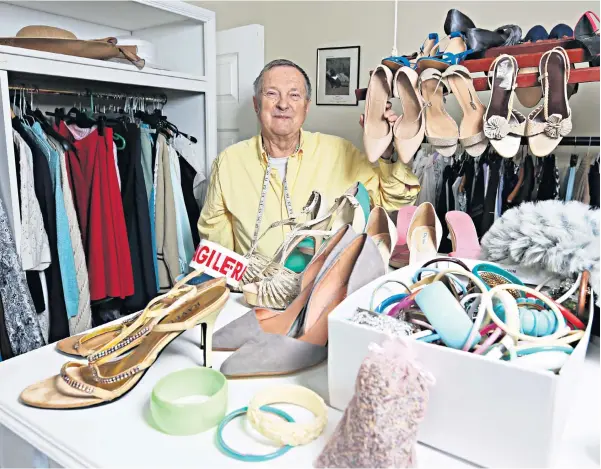  ?? ?? g Cupboard love: Nick with a selection of Jeanette’s clothes and shoes