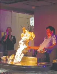  ?? ?? SHOW. Makoto Sudo, director of Jetro Manila, at the teppanyaki grill at Kazuwa Prime — executive chef Elvin Quintero looks on proudly.