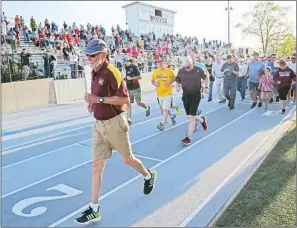  ??  ?? Karl Koonce leads the way during the final bell lap around the track April 12 during the Lake Hamilton Invitation­al.