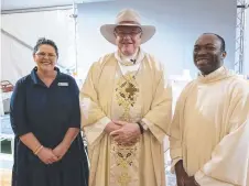  ?? ?? Columba principal Melissa Turner, Archbishop Charles Balvo and Fr Emmanuel Anorue.