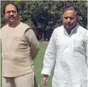  ??  ?? WHO IS THE THIRD? AMAR SINGH AND MULAYAM SINGH YADAV