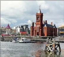  ?? Rick Steves’ Europe/RICK STEVES ?? Sometimes called the “Welsh Big Ben,” the landmark Pierhead Building dominates the waterfront in Cardiff’s Docklands district.