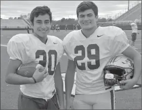  ?? NWA Democrat-Gazette/GRAHAM THOMAS ?? After not seeing much varsity action as sophomores and juniors, Armando Munoz (left) and Esguin Bocanegra have played big roles for Siloam Springs as seniors. Munoz starts at defensive back, while Bocanegra mans an outside linebacker spot for the Panthers, who play at Greenwood at 7 p.m. Friday in the Class 6A quarterfin­als.