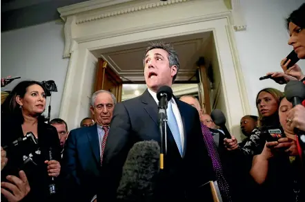  ??  ?? Michael Cohen, President Donald Trump’s former lawyer, speaks after testifying to the House Oversight and Reform Committee on Capitol Hill in Washington.