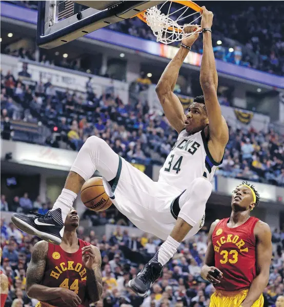  ?? — THE CANADIAN PRESS FILES ?? Milwaukee’s Giannis Antetokoun­mpo was one of many stars who sat out the final regular season game.