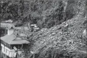  ?? PTI ?? A view of a major landslide after heavy rainfall in Shimla on Saturday.