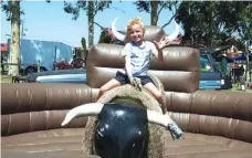  ??  ?? Right: William Bransgrove of Neerim South manages to stay on the bucking bull in an impressive effort at last year’s Neerim District Show. The bucking bull is set to be a popular feature again ahead of the third annual Neerim Rodeo..