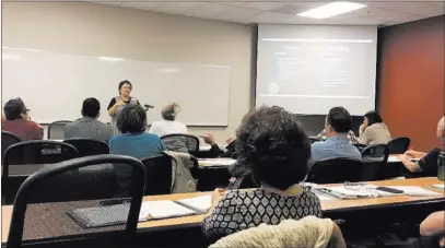  ?? Madelyn Reese ?? Las Vegas Review-journal @Madelyngre­ese Instructor Julie Davies leads a crash course Feb. 9 at the West Charleston campus of the College of Southern Nevada. Davies guides attendees through the gantlet of offering properties for short-term rental.