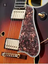  ??  ?? 5. The PAF humbucker became a standard fixture on electric Super 400s during 1958 and was endowed with a pair of gold-plated covers to match the bridge, tailpiece and tuners 5