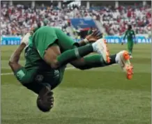  ?? DARKO VOJINOVIC — THE ASSOCIATED PRESS ?? Saudi Arabia’s Salem Aldawsari celebrates with a flip after scoring his side’s second goal during the group A match between Saudi Arabia and Egypt at the 2018 soccer World Cup at the Volgograd Arena in Volgograd, Russia, Monday.