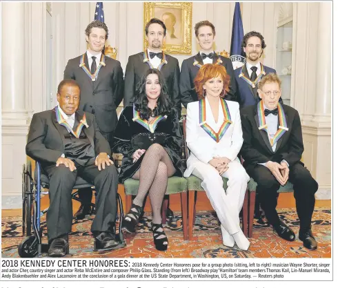  ??  ?? 2018 Kennedy Center Honorees pose for a group photo (sitting, left to right) musician Wayne Shorter, singer and actor Cher, country singer and actor Reba McEntire and composer Philip Glass. Standing (from left) Broadway play ‘Hamilton’ team members Thomas Kail, Lin-Manuel Miranda, Andy Blakenbueh­ler and Alex Lacamoire at the conclusion of a gala dinner at the US State Department, in Washington, US, on Saturday. — Reuters photo
