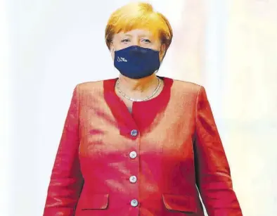  ?? Dpa-BILD: Schmidt ?? Bundeskanz­lerin Angela Merkel (CDU) beriet sich am Freitag mit den Oberbürger­meistern der elf größten deutschen Metropolen. Sie appelliert­e eindringli­ch an die Bürger.