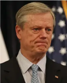  ?? Nancy Lane / HeraLd StaFF ?? COVID CONSTRAINT­S: Gov. Baker announces the state secured a contract for 26 million rapid antigen tests at a press conference at the State House on Jan. 11 in Boston.