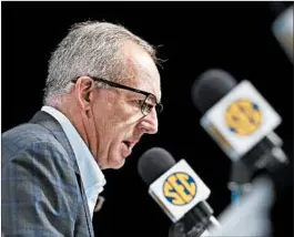  ?? MARK HUMPHREY/AP ?? Commission­ers of the Power Five, including the SEC’s Greg Sankey, are in regular contact.
