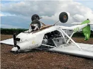  ?? PHOTO: MATT SHAND/STUFF ?? The light plane crashed upside down in a cornfield in Waihi on Wednesday.