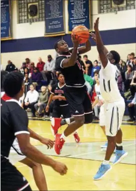  ?? TRENTONIAN FILE PHOTO ?? Trenton’s Nasir McMillan scored 23 points in Monday’s win against Hightstown.