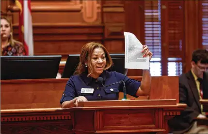  ?? NATRICE MILLER/NATRICE.MILLER@AJC.COM ?? Rep. Mesha Mainor, R-Atlanta, speaks in favor of Senate Bill 233 at the Georgia State Capitol on March 14. The bill, which Gov. Brian Kemp now can sign into law, would give $6,500 a year in state funds to the parents of each child who opts for private schooling.