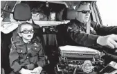  ?? DENVER POLICE DEPARTMENT 2017 ?? Olivia Gant rides with Cpt. Tim Scudder in April 2017 Denver. Olivia, 7, died later that year in hospice care. in