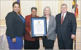  ?? SUBMITTED PHOTO ?? In November 2016, Rebecca Jones-Gaston, left, executive director of the Social Services Administra­tion, presented the Place Matters Award to Wanda Collins, administra­tor of Child Protective Services and family preservati­on services, along with Kelly...