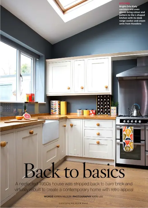  ??  ?? KITCHEN Bright Orla Kiely canisters and oven gloves bring colour and pattern to the L-shaped kitchen with its sleek range cooker and cream units from Howdens