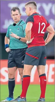  ??  ?? England skipper Owen Farrell with referee Nigel Owens yesterday