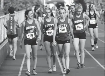  ?? File photo by Jerry Silberman / risportsph­oto.com ?? The Mount St. Charles 4x400-meter relay team made up of Marina Schmid, Hannah Tousignant, Faye Cournoyer and Eileen Whalen finished third at the state meet to earn a spot at New Englands Saturday in Norwell, Mass.