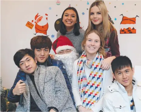  ??  ?? Georgia Alsop-Hanley (second from right, front) with friends at her school in China.