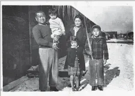  ??  ?? “THERE IS SOLACE in returning to the site where violations occurred,” says former state Assemblyma­n George Nakano, right, at Tule Lake as a boy in 1946.