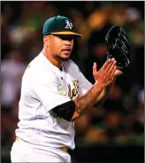  ?? SHAE HAMMOND/BAY AREA NEWS GROUP ?? The Athletics' Frankie Montas applauds after Billy McKinney threw out a runner at home against the Orioles in Oakland on Monday.