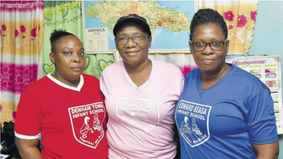  ?? (Photos: Karl Mclarty) ?? Principal May Pinnock-mitchell is flanked by teachers Natalee Dunkley (left) and Marsha Richards-smith.