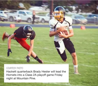  ?? COURTESY PHOTO ?? Hackett quarterbac­k Brady Hester will lead the Hornets into a Class 2A playoff game Friday night at Mountain Pine.