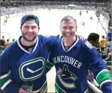  ?? Special to The Okanagan Weekend ?? Alex MacNaull, left, and his reporter dad, Steve MacNaull, at the San Jose Sharks-Vancouver Canucks game at SAP Centre.