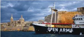  ?? (Yannis Behrakis/Reuters) ?? THE SEARCH and rescue vessel ‘Golfo Azzurro’ departs from the Port of Malta to locate migrants in the Mediterran­ean and bring them to safety last December.