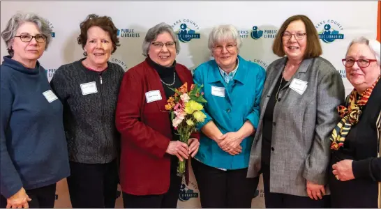  ?? PHOTOS COURTESY OF BERKS COUNTY PUBLIC LIBRARIES ?? Berks County Public Libraries Advisory Board member Helen Flynn, second from right, stands with others from the Mifflin Community Library to celebrate Diane Pawling’s win of the Linda Baer Friend of the Year Award.