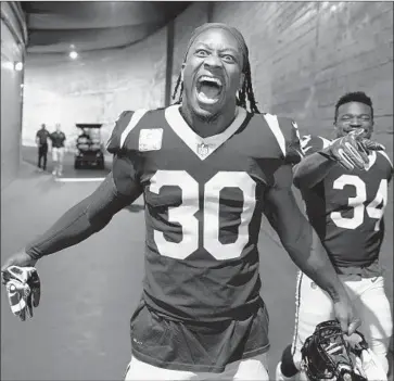  ?? Photograph­s by Wally Skalij Los Angeles Times ?? TODD GURLEY and the Rams can be counted on to come out of the Coliseum tunnel with excitement and intensity after Monday’s game was moved from Mexico City because of poor field conditions.