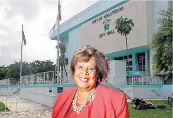  ?? MIKESTOCKE­R/SOUTHFLORI­DASUNSENTI­NEL ?? Linda Anderson stands in front of Hollywood City Hall onWednesda­y. Andersonwa­s elected to the commission onTuesday and will be sworn inNov. 18 as the first Black commission­er in Hollywood history.