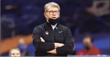  ?? NewElsa / Getty Images ?? UConn coach Geno Auriemma will have a stacked roster next season. Returning players will include Paige Bueckers (top photo right), Olivia Nelson-Ododa (top photo center), Aaliyah Edwards (top photo left), Christyn Williams (middle left) and Evina Westbrook (middle center). Newcomers will include freshman Azzi Fudd (middle right) and transfer Dorka Juhasz (bottom left).