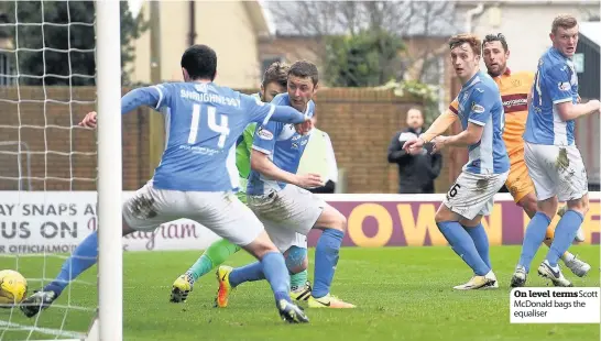  ??  ?? On level terms Scott McDonald bags the equaliser