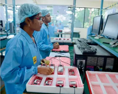  ?? AFP ?? India says it has a phased programme to manufactur­e phones, aiming to step up value added locally every year. —