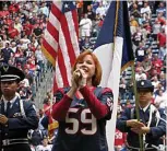  ?? Submitted photos ?? Nancy Curtis, above, sings the national anthem for the Houston Texans every year, an experience that is “fun and scary,” she says.