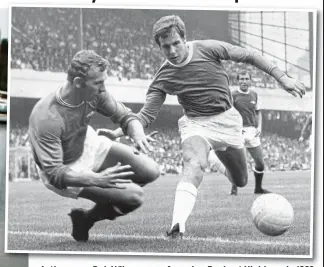  ??  ?? Action man: Bob Wilson saves from Joe Royle at Highbury in 1969