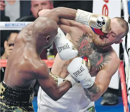  ?? — GETTY IMAGES FILES ?? In the words of one Twitter user, Saturday’s bout in Las Vegas between boxing great Floyd Mayweather Jr. and UFC superstar Conor McGregor showed that, ‘For once boxing didn’t suck.’