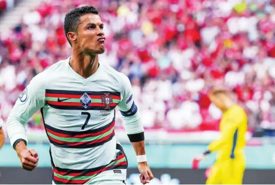  ?? AP ?? Cristiano Ronaldo celebra uno de los dos goles que marcó a Hungría