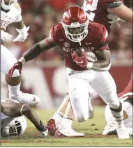  ?? (NWA Democrat-Gazette/Charlie Kaijo) ?? Arkansas running back Raheim Sanders ran for 50 yards and a touchdown as part of a 333-yard, four-touchdown performanc­e for the Razorbacks in Saturday’s 40-21 victory over Texas. Arkansas outgained Texas 471 to 256 yards in total offense.