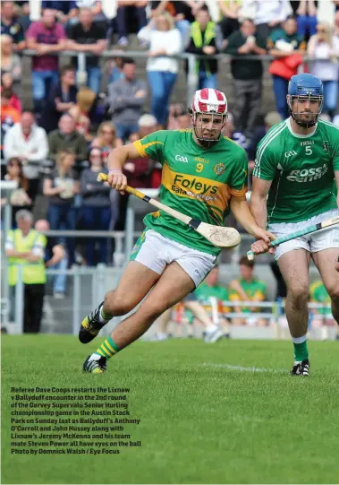  ??  ?? Referee Dave Coops restarts the Lixnaw v Ballyduff encounter in the 2nd round of the Garvey Supervalu Senior Hurling championsh­ip game in the Austin Stack Park on Sunday last as Ballyduff’s Anthony O’Carroll and John Hussey along with Lixnaw’s Jeremy...