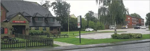  ??  ?? The new 3,000 sq ft store will be built between the village hall and the New Chimneys pub