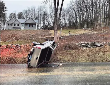  ?? Dodgingtow­n Volunteer Fire Company No. 1 / Contribute­d photos ?? Stony Hill Volunteer Fire Company responded to a car rolled over on Route 58 near Saras Way in Bethel just before 7:30 a.m. Wednesday. The driver was able to get out of the car himself and was evaluated by EMS, but declined care.