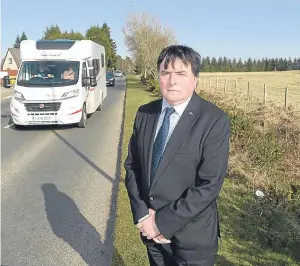  ??  ?? UNHAPPY: Councillor Ken Gowans at the site of the contentiou­s applicatio­n