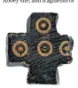  ??  ?? Whitby jet pendant cross inlaid with silver, 9th to 11th century